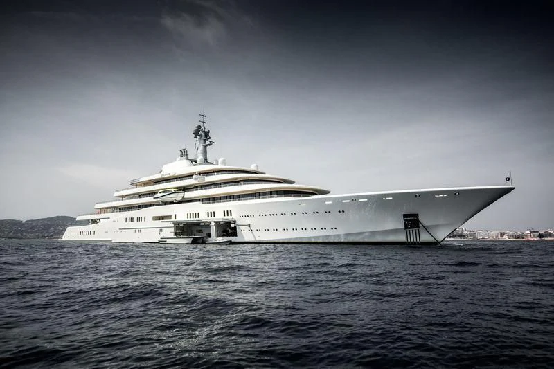 a large ship in the water aboard ECLIPSE Yacht for Sale