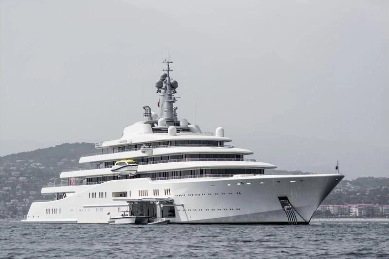 a large white ship in the water aboard ECLIPSE Yacht for Sale