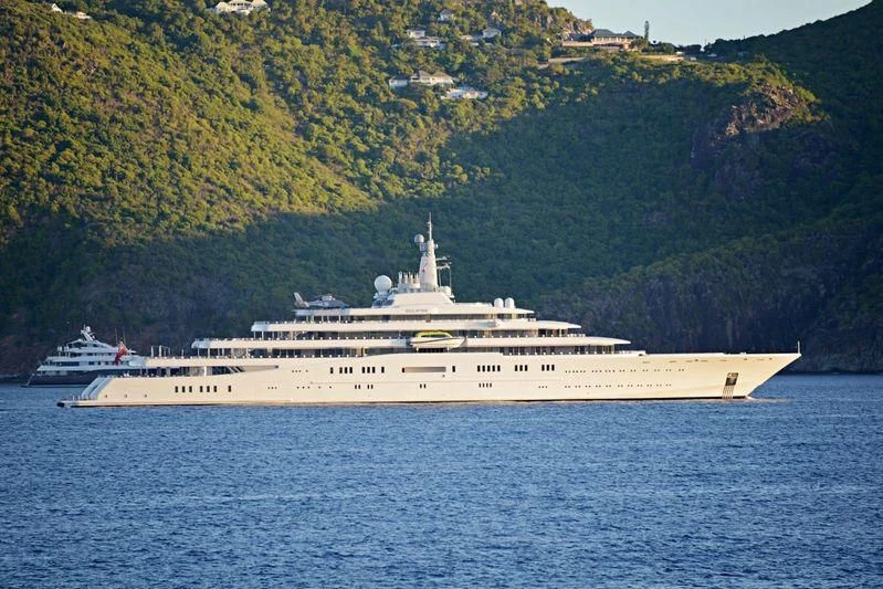 a large ship in the water aboard ECLIPSE Yacht for Sale