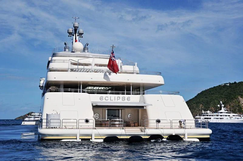 a large white boat in the water aboard ECLIPSE Yacht for Sale