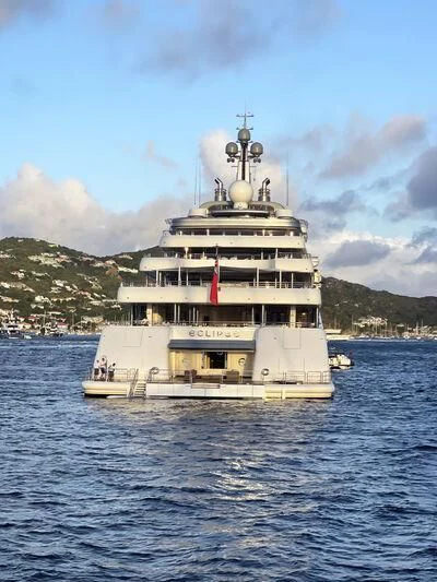 a large white ship in the water aboard ECLIPSE Yacht for Sale