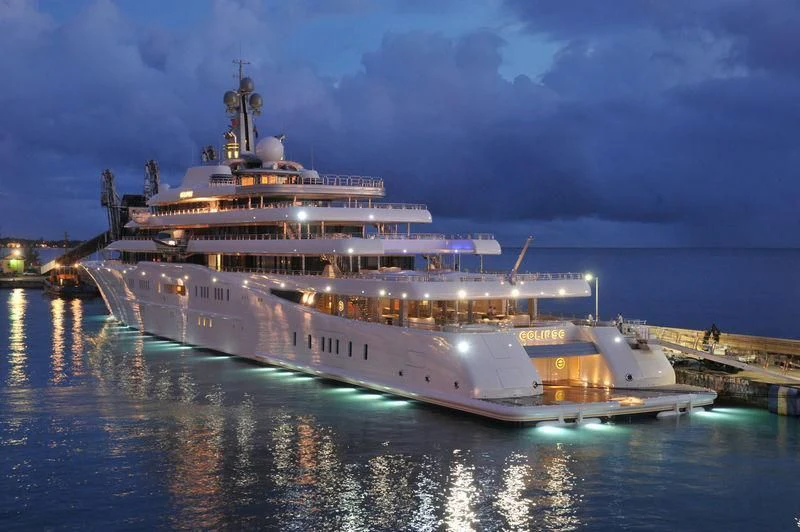 a large cruise ship at night aboard ECLIPSE Yacht for Sale