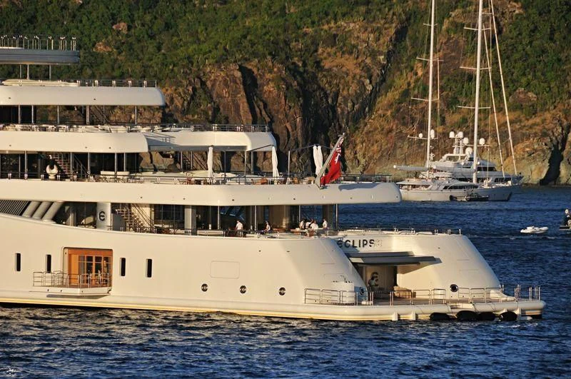 a large white boat in the water aboard ECLIPSE Yacht for Sale