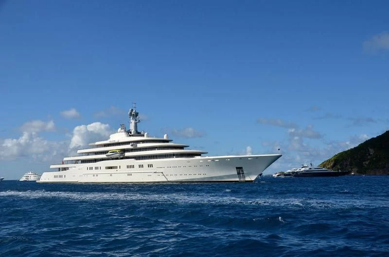 a white yacht in the water aboard ECLIPSE Yacht for Sale