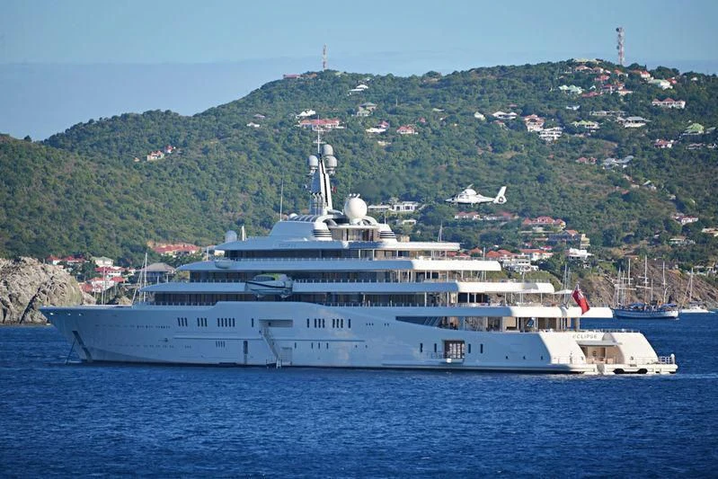 a large ship in the water aboard ECLIPSE Yacht for Sale