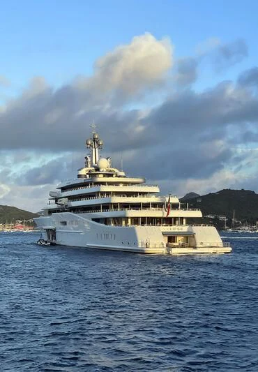 a large white boat in the water aboard ECLIPSE Yacht for Sale