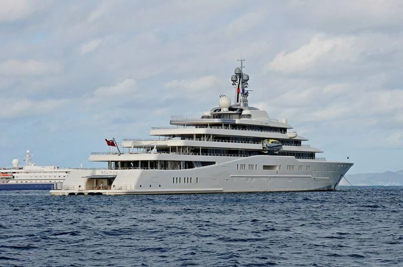 a large white ship in the water aboard ECLIPSE Yacht for Sale
