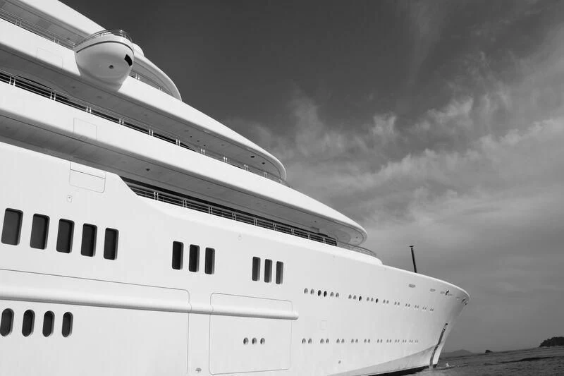 a white yacht on the water aboard ECLIPSE Yacht for Sale