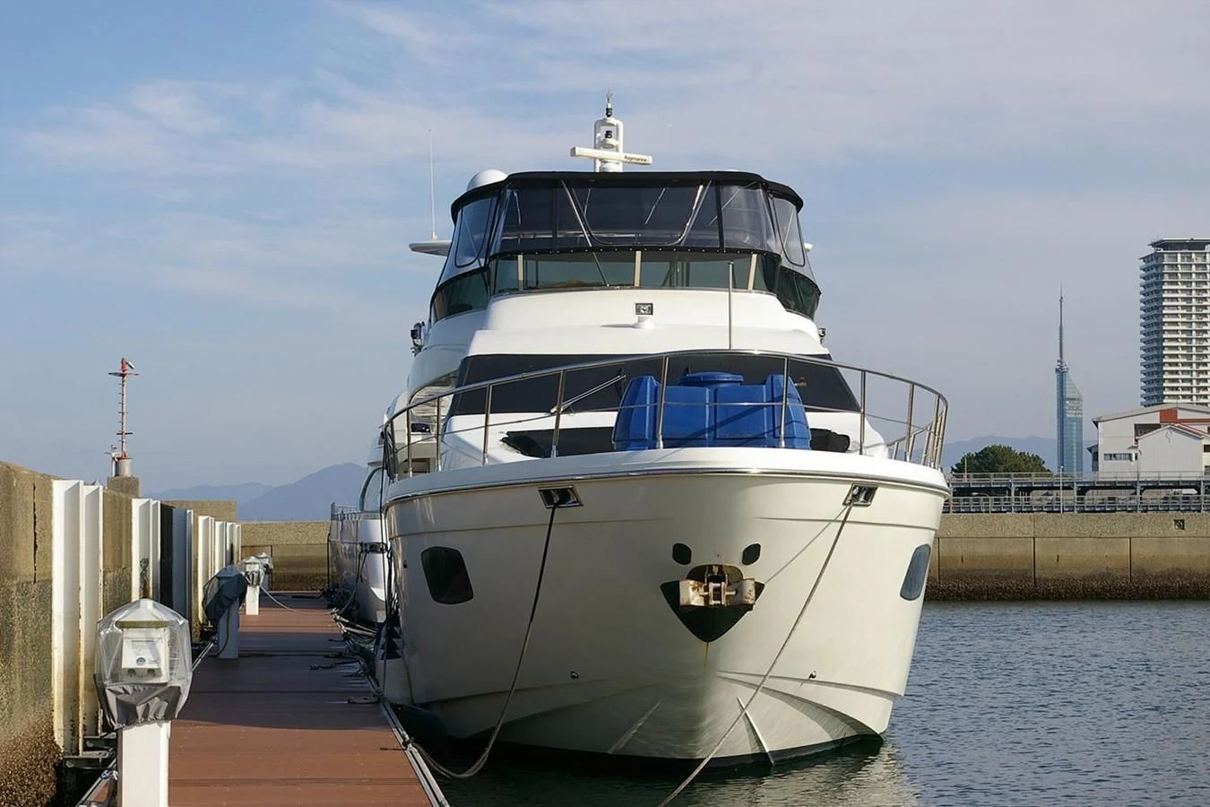 a boat docked at a pier aboard VICTORIA V Yacht for Sale