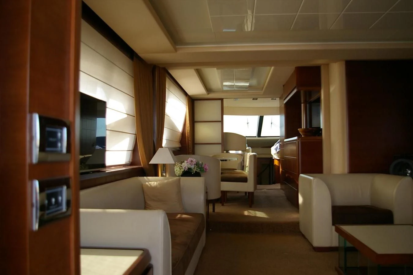 a room with couches and a television aboard VICTORIA V Yacht for Sale