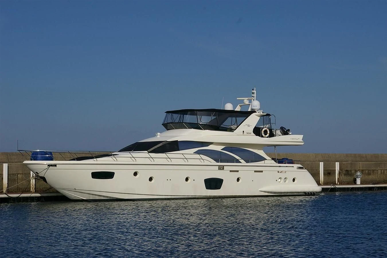 a white yacht in the water aboard VICTORIA V Yacht for Sale
