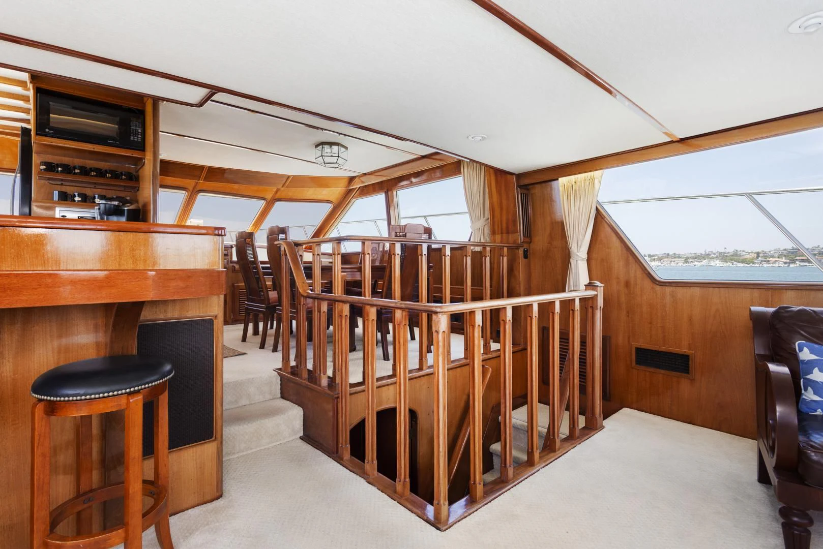 a wooden bunk bed in a room aboard EL AMO Yacht for Sale