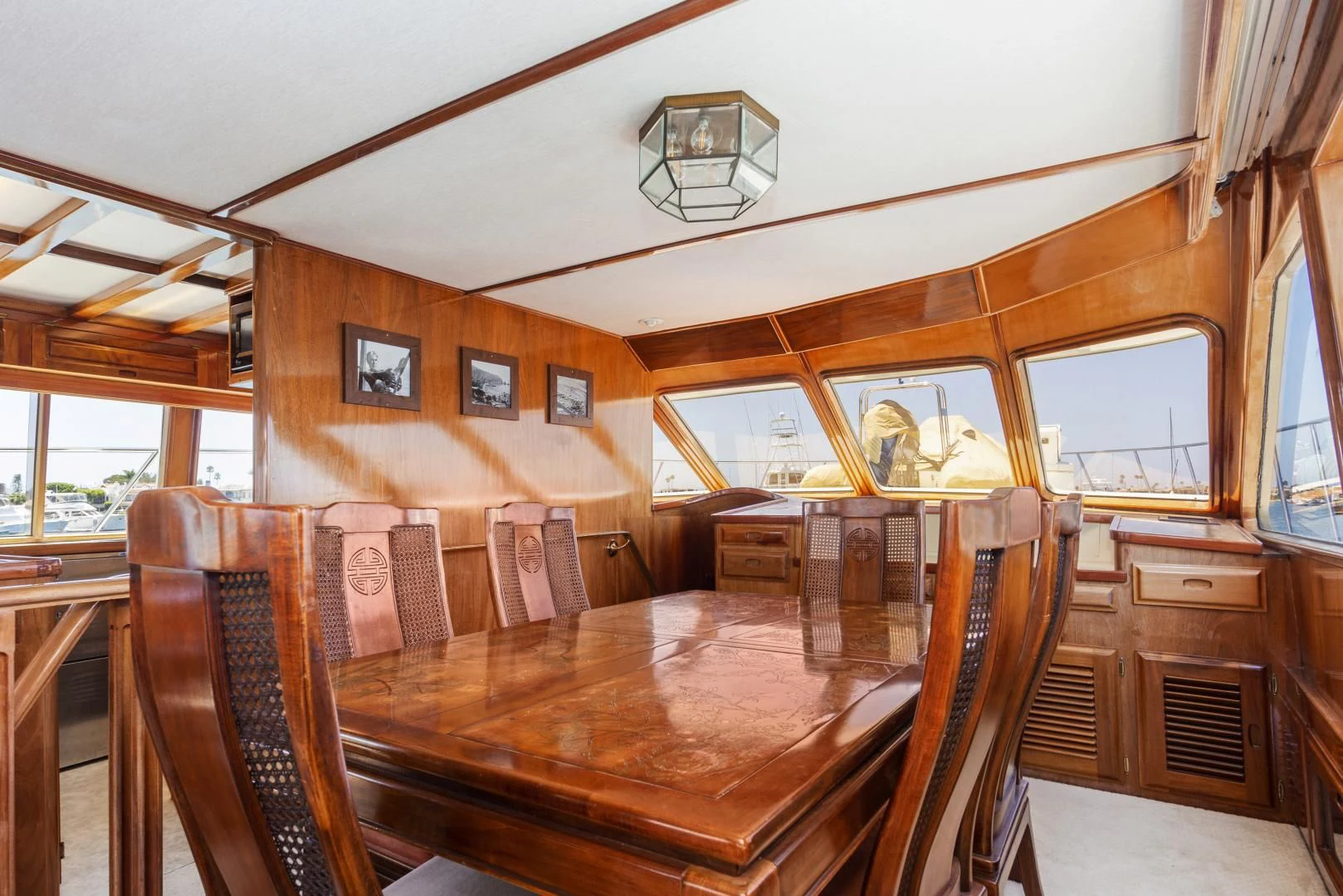a dining table in a cabin aboard EL AMO Yacht for Sale