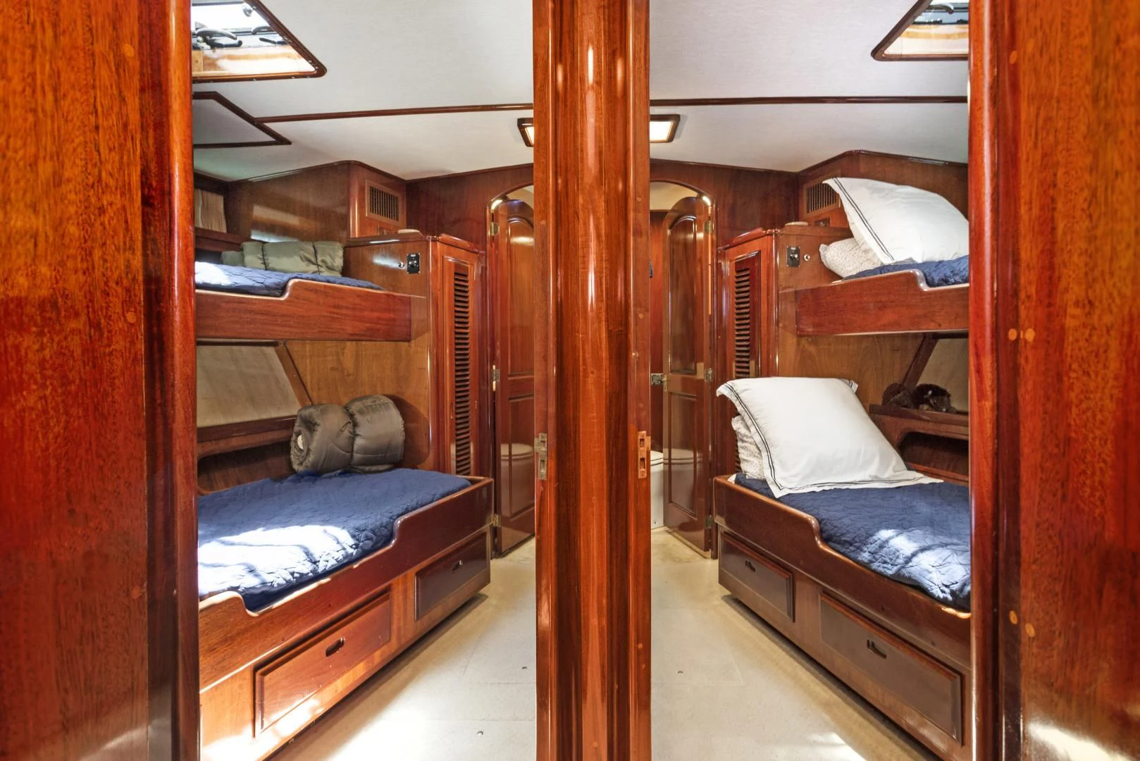 a room with bunk beds aboard EL AMO Yacht for Sale