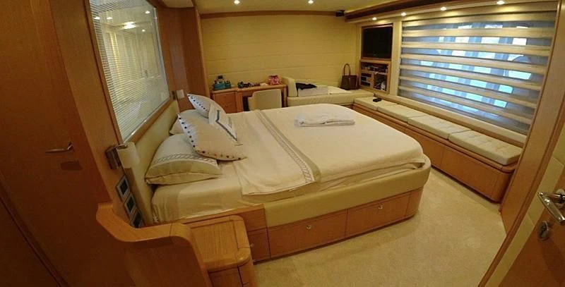 a bed in a room aboard CHUPRIANA Yacht for Sale