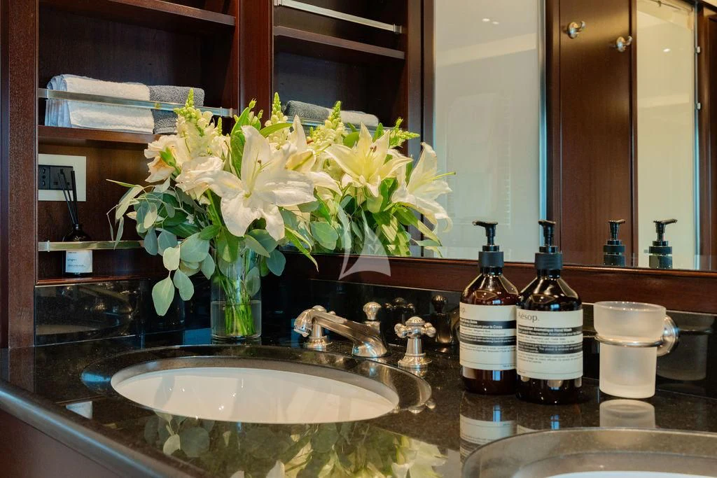 a sink with flowers in it aboard GALILEO Yacht for Sale