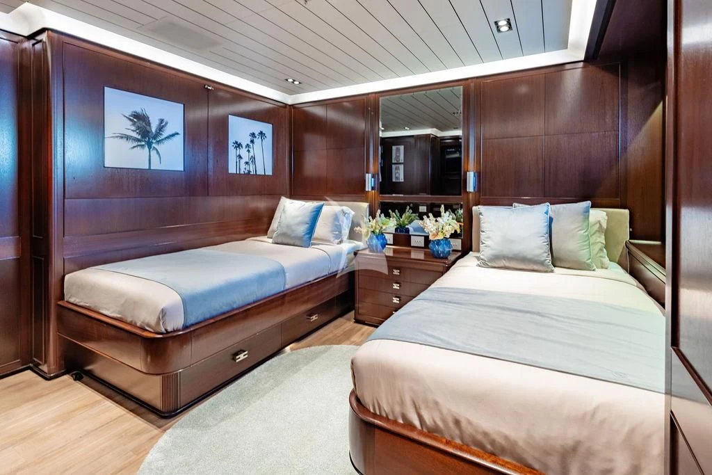 a room with two beds aboard GALILEO Yacht for Sale