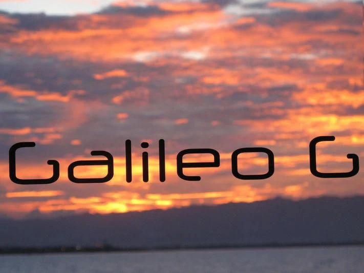 a sunset over a body of water aboard GALILEO Yacht for Sale