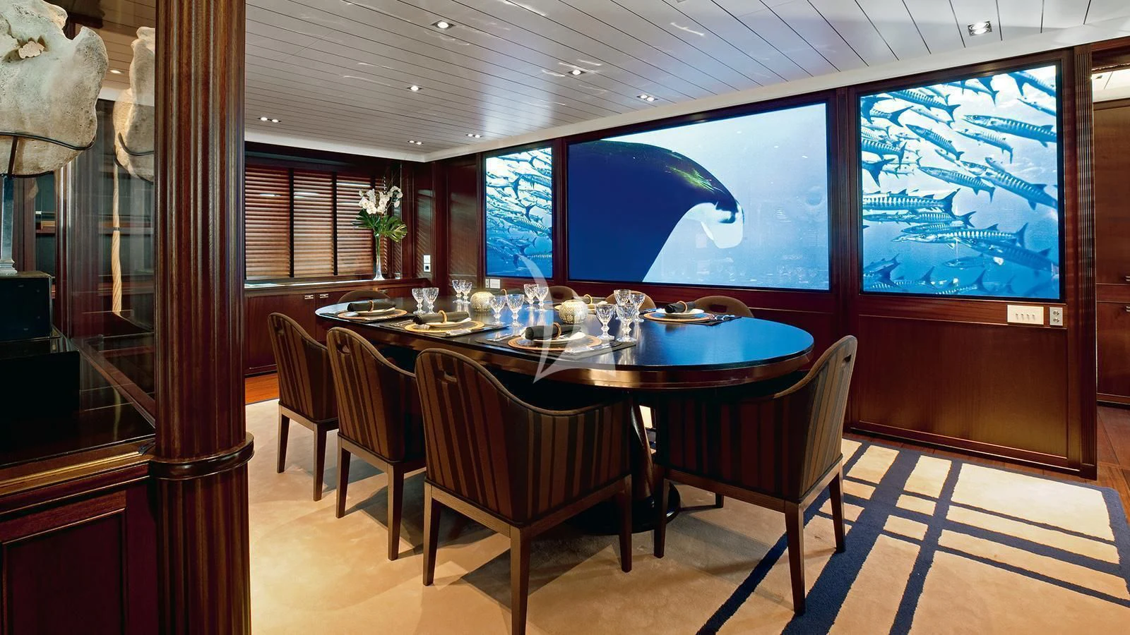 a table set for a dinner aboard GALILEO Yacht for Sale