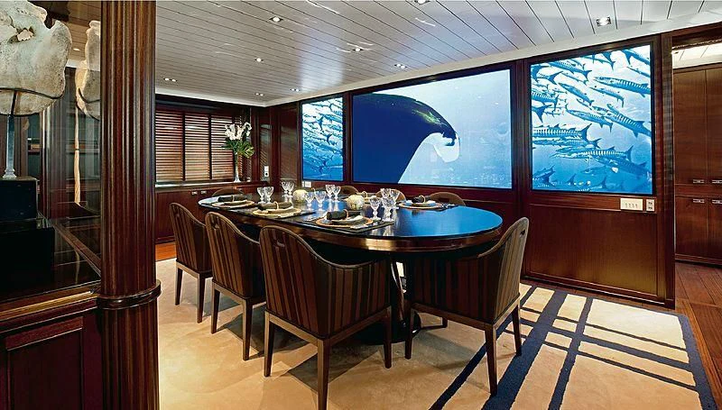 a table set for a dinner aboard GALILEO Yacht for Sale