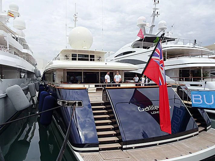 a boat with a flag on the front aboard GALILEO Yacht for Sale