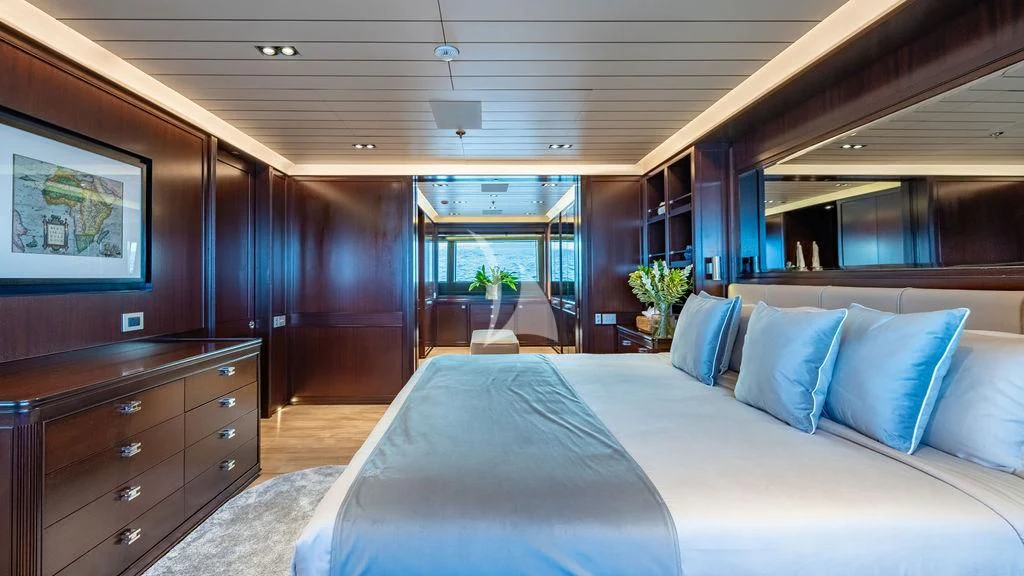 a bed in a room aboard GALILEO Yacht for Sale
