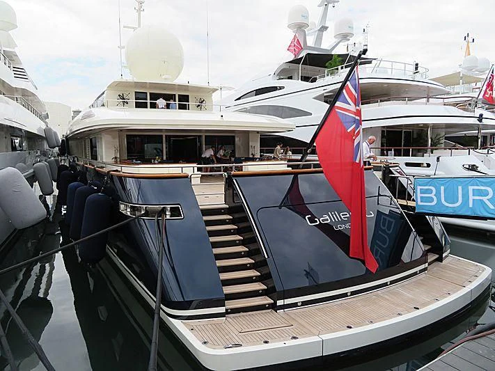 a boat with a flag on the front aboard GALILEO Yacht for Sale