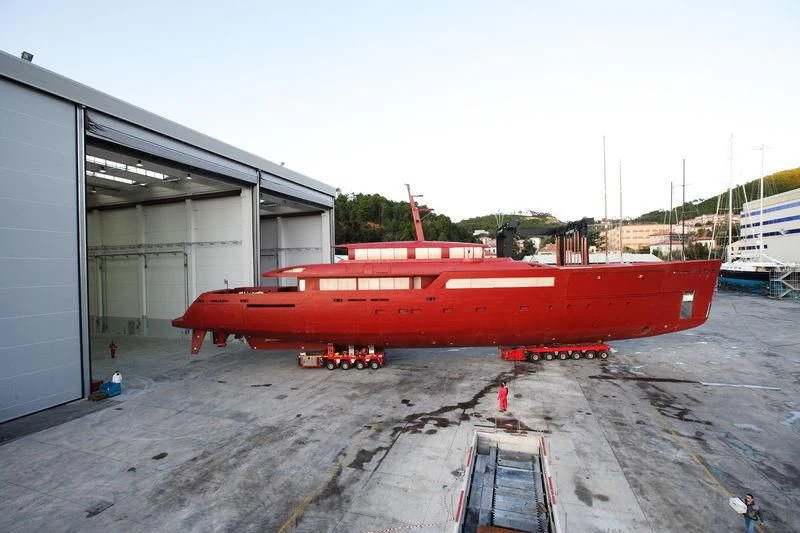 a red and white airplane aboard GALILEO Yacht for Sale