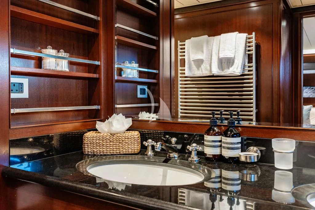 a bathroom sink with a mirror above it aboard GALILEO Yacht for Sale