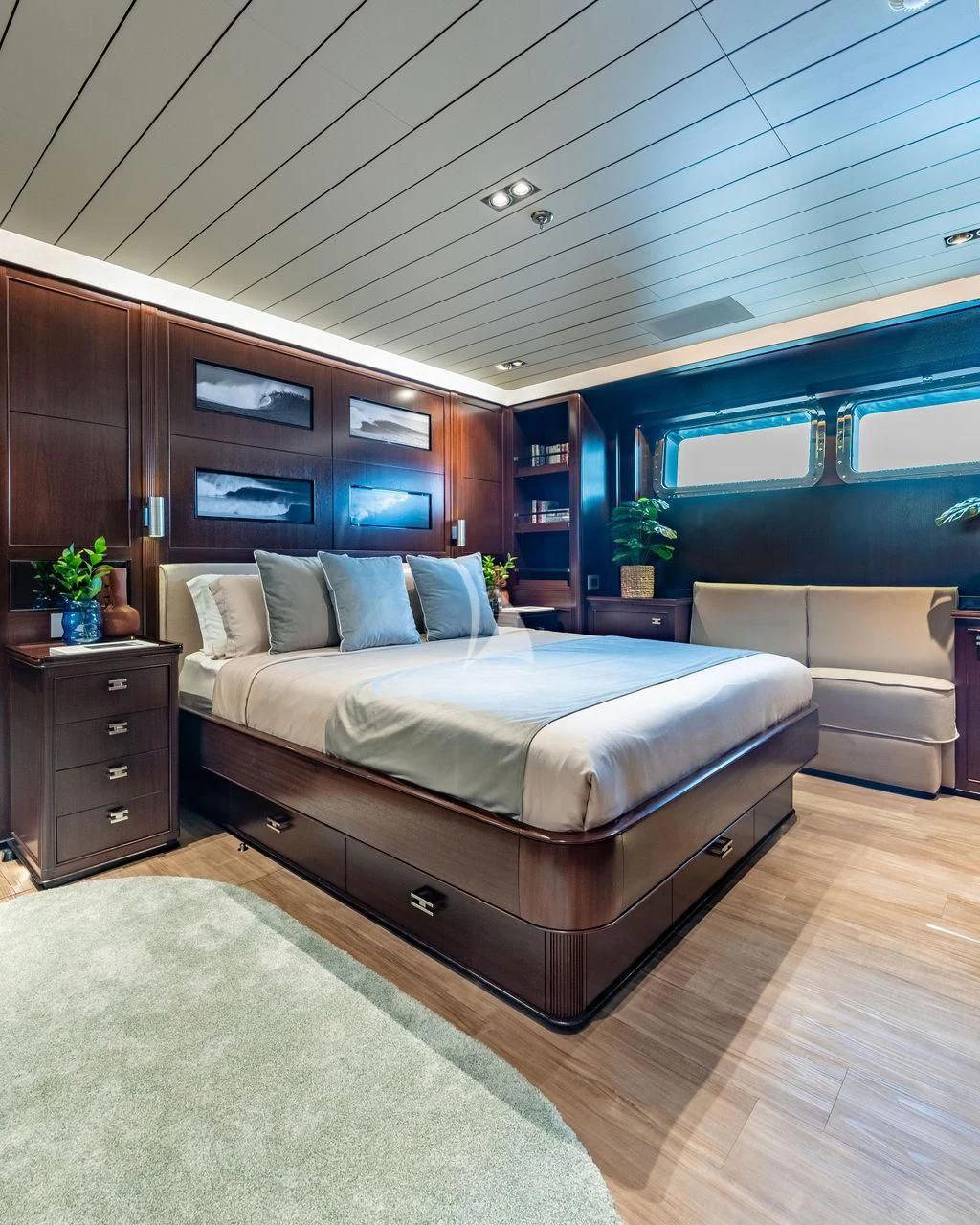 a large bed in a room aboard GALILEO Yacht for Sale