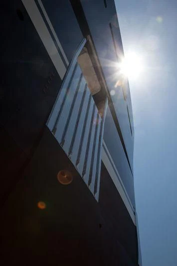 a tall building with a light shining on it aboard GALILEO Yacht for Sale