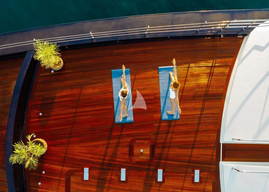 a wood wall with a couple of mannequins on it aboard GALILEO Yacht for Sale