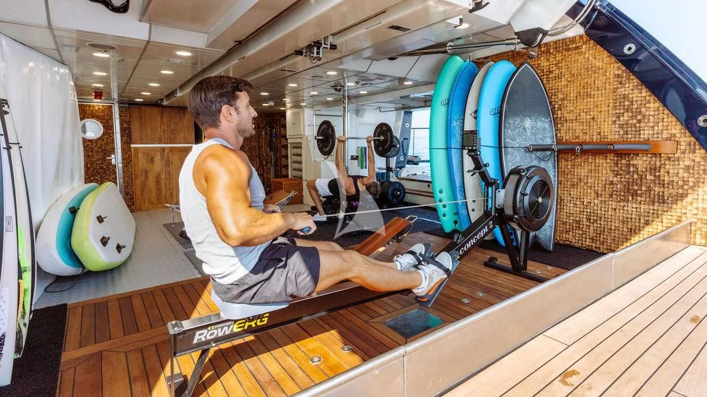 a person working on a machine aboard GALILEO Yacht for Sale