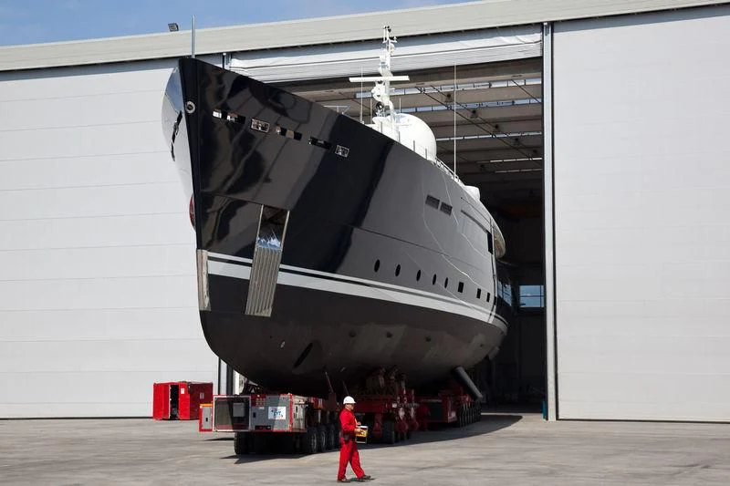 a person standing next to a space shuttle aboard GALILEO Yacht for Sale