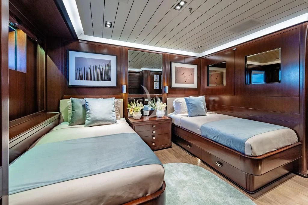 a couple of beds in a room aboard GALILEO Yacht for Sale