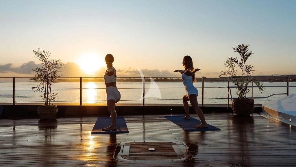 a couple of people on a dock aboard GALILEO Yacht for Sale