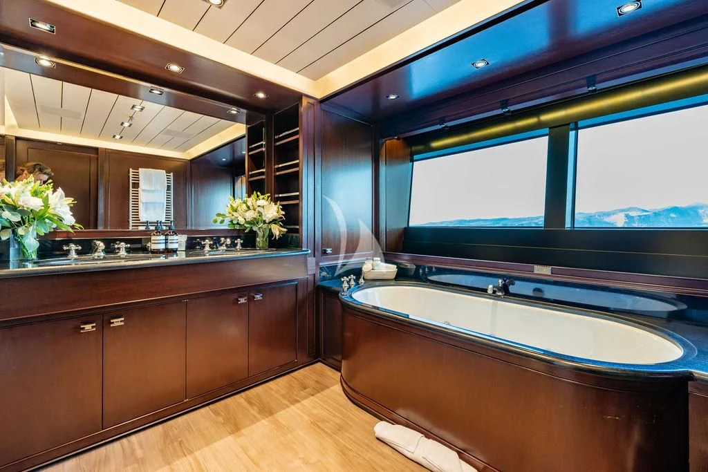 a large bathroom with a large tub aboard GALILEO Yacht for Sale