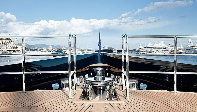 a deck with a deck and a view of a city aboard GALILEO Yacht for Sale
