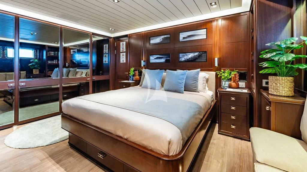a bed in a room aboard GALILEO Yacht for Sale