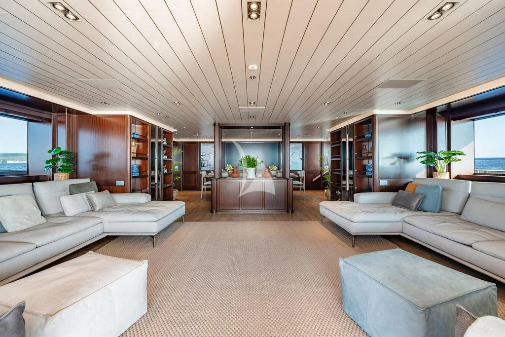 a living room with a large open window aboard GALILEO Yacht for Sale