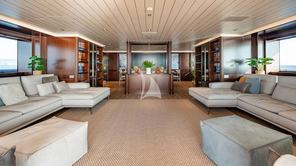 a living room with a large open window aboard GALILEO Yacht for Sale