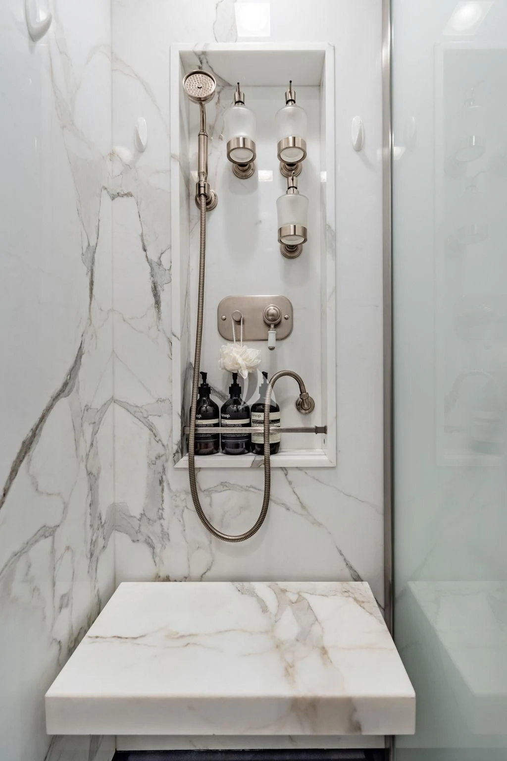 a white bathtub with a faucet and a sink aboard GALILEO Yacht for Sale