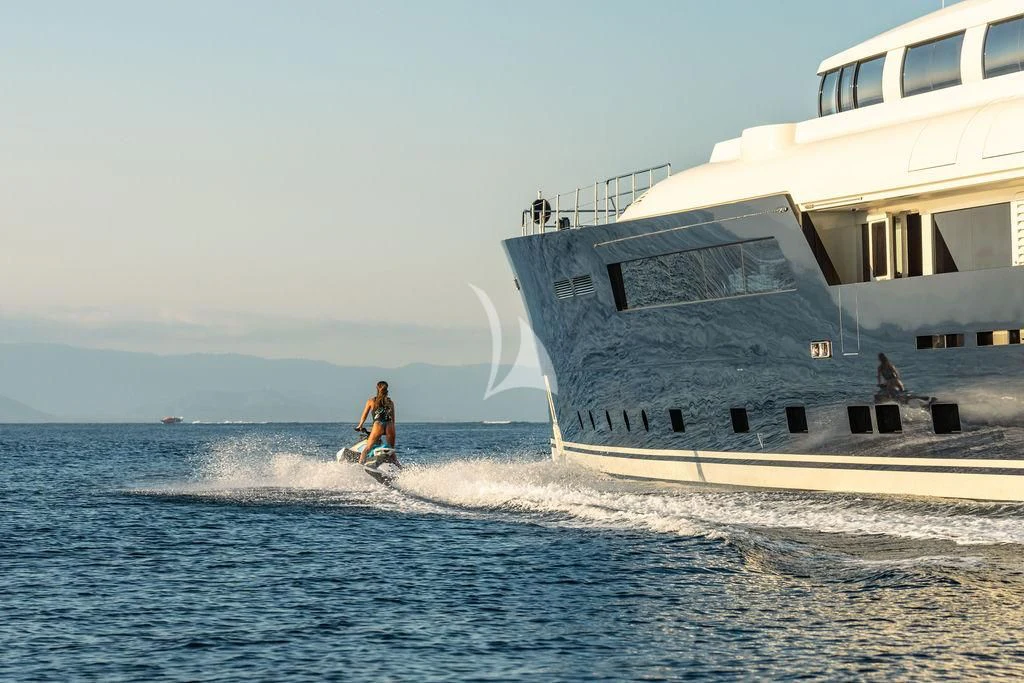 a person surfing in the sea aboard GALILEO Yacht for Sale