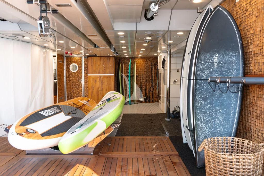 a room with a bed and a laptop on the floor aboard GALILEO Yacht for Sale