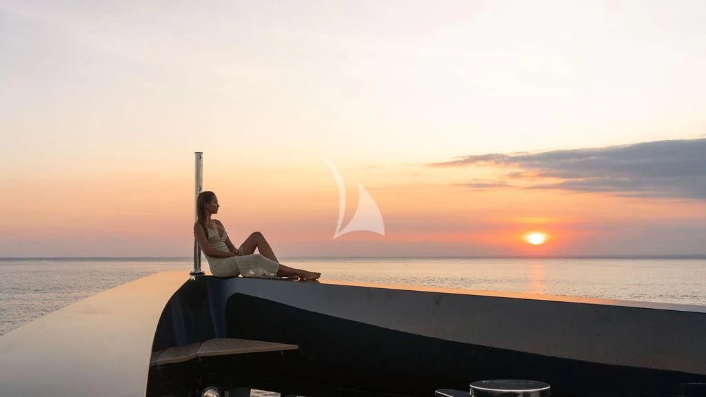 a person sitting on a boat aboard GALILEO Yacht for Sale