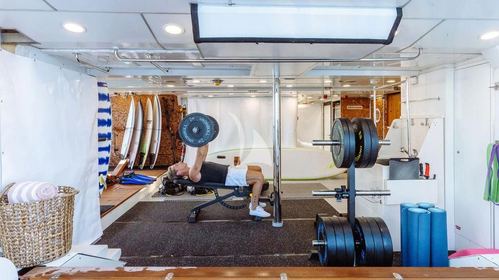 a person working out in a room aboard GALILEO Yacht for Sale