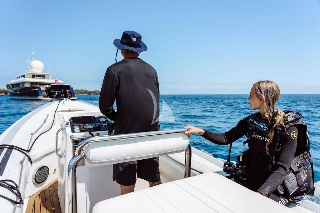 a man and a woman on a boat aboard GALILEO Yacht for Sale