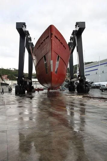 a large red cylindrical object on a metal surface aboard GALILEO Yacht for Sale