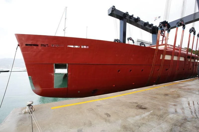 a large red boat aboard GALILEO Yacht for Sale