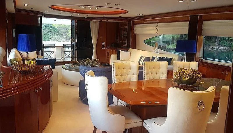 a living room with a large window aboard NATALIA Yacht for Sale
